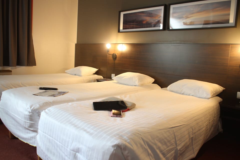 Triple Room | Desk, blackout drapes, soundproofing, iron/ironing board