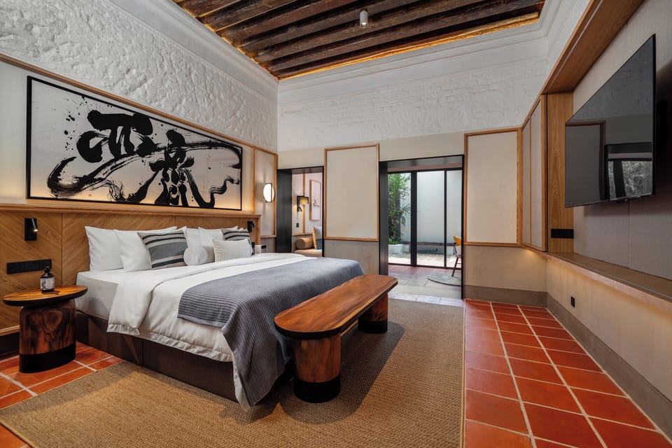 Garden Suites | Free minibar items, in-room safe, desk, laptop workspace