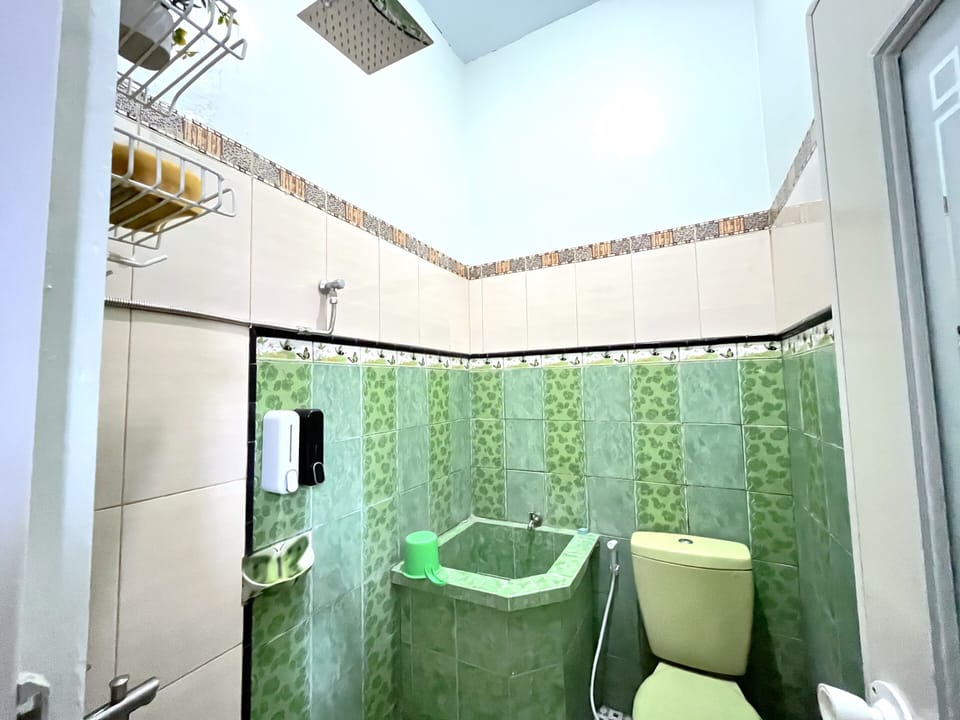Shower, slippers, towels, soap