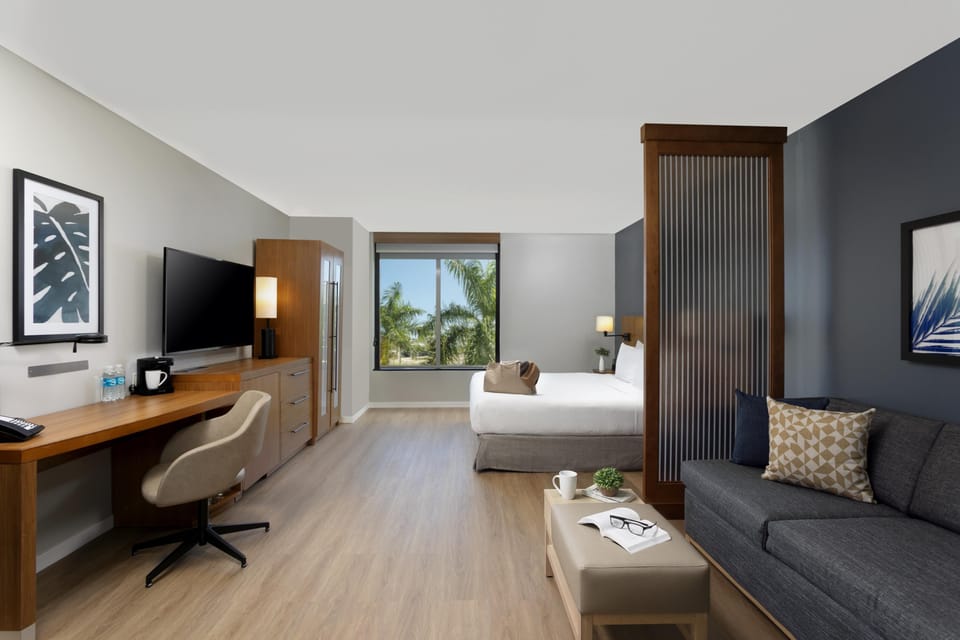 Suite, 1 King Bed with Sofa bed, Accessible (Shower) | Premium bedding, pillowtop beds, in-room safe, desk