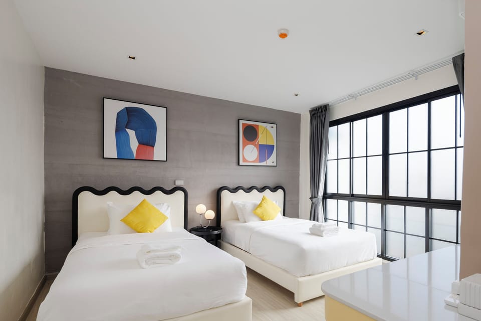 Laa Laa Deluxe Twin Beds Room | Individually decorated, individually furnished, desk, laptop workspace