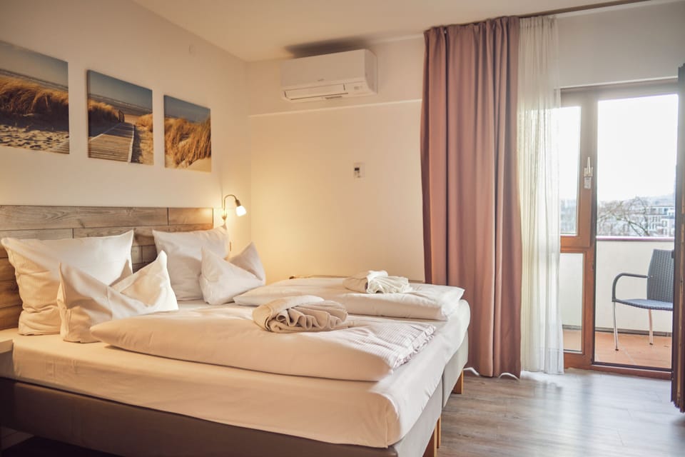 Hypo-allergenic bedding, in-room safe, desk, laptop workspace