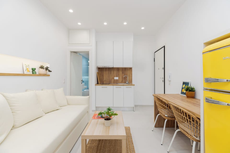 Superior Studio, Balcony, City View | Living area | Flat-screen TV