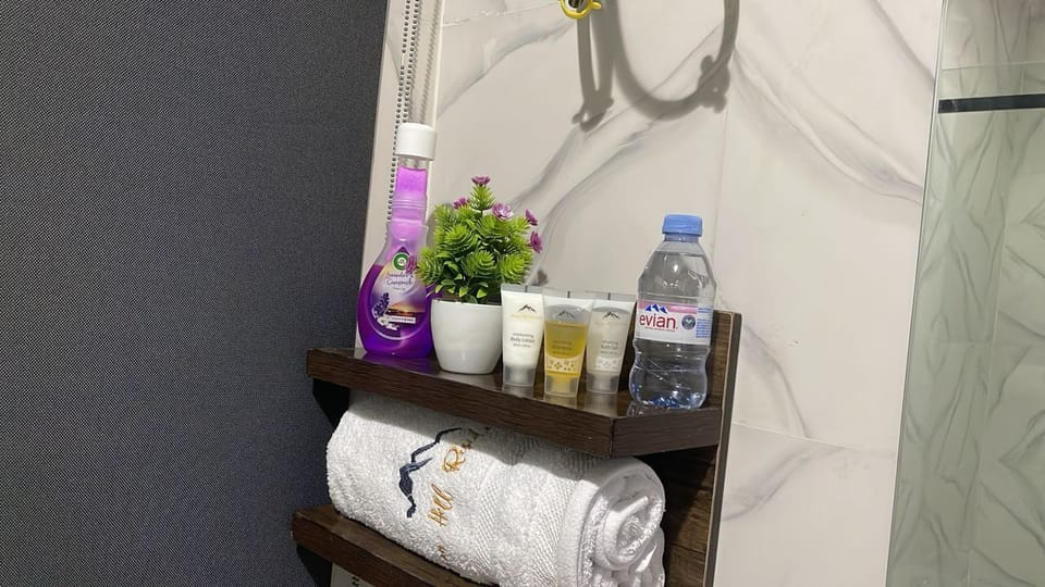 Classic Single Room, City View | Bathroom | Slippers, bidet, towels, soap