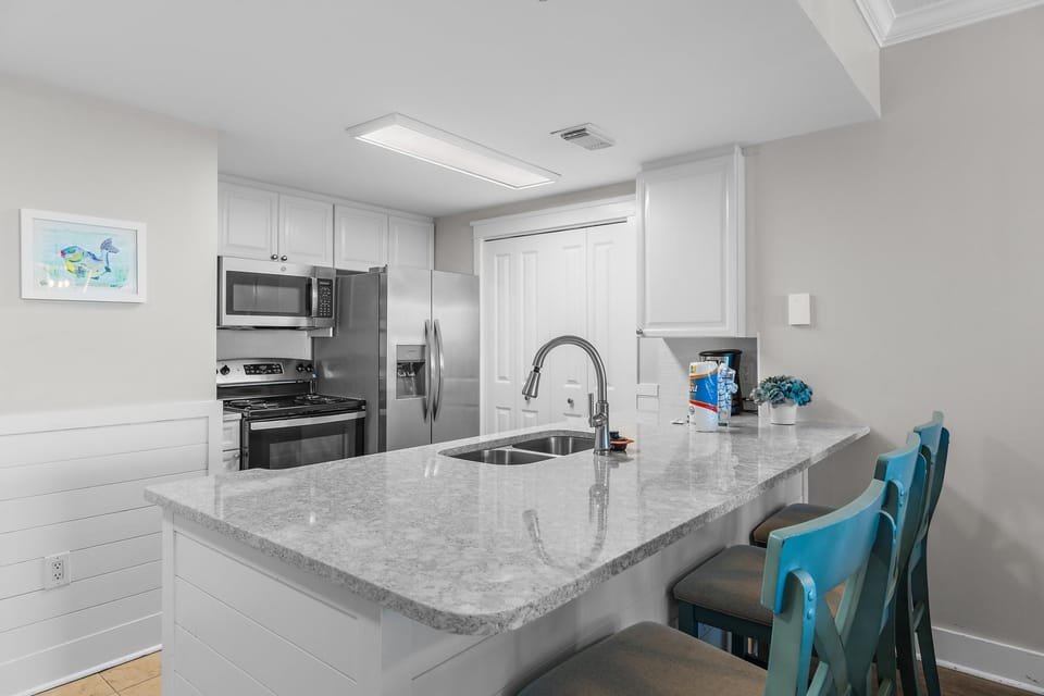 Condo, Multiple Beds (Waterscape 535-A) | Private kitchen | Oven, toaster
