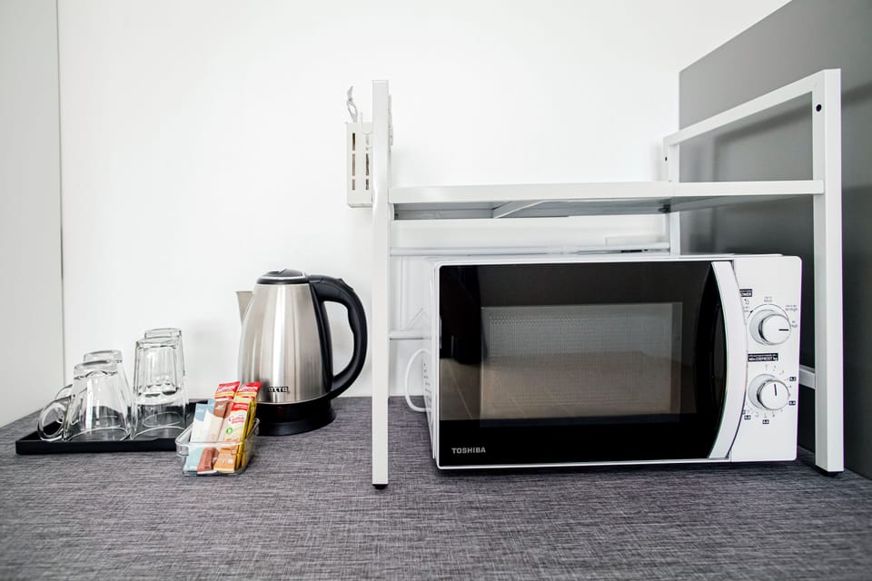 Standard Double Room, Partial Sea View | In-room safe, iron/ironing board, free WiFi