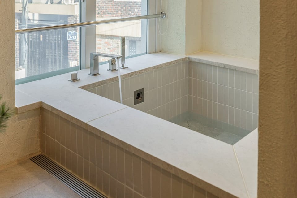 Standard Double Room, City View | Private spa tub