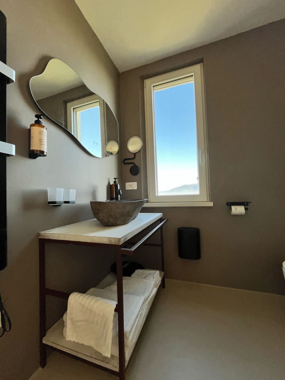 Shower, hair dryer, slippers, towels
