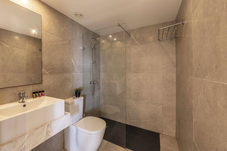 Suite, 1 Bedroom | Bathroom | Hair dryer, towels, soap, shampoo