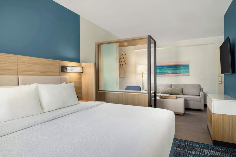 Hypo-allergenic bedding, desk, laptop workspace, iron/ironing board