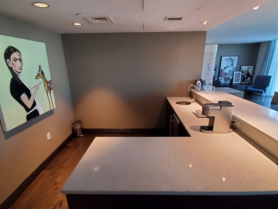 Suite, 1 King Bed, Non Smoking | Private kitchen | Fridge, coffee/tea maker