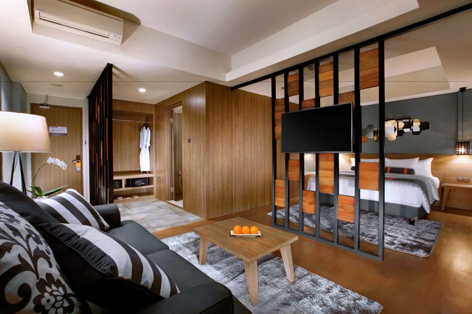 Suite | Living room | 42-inch LCD TV with satellite channels, TV