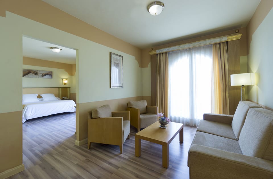 Junior Suite, 1 Queen Bed, Garden View | Down comforters, minibar, in-room safe, desk