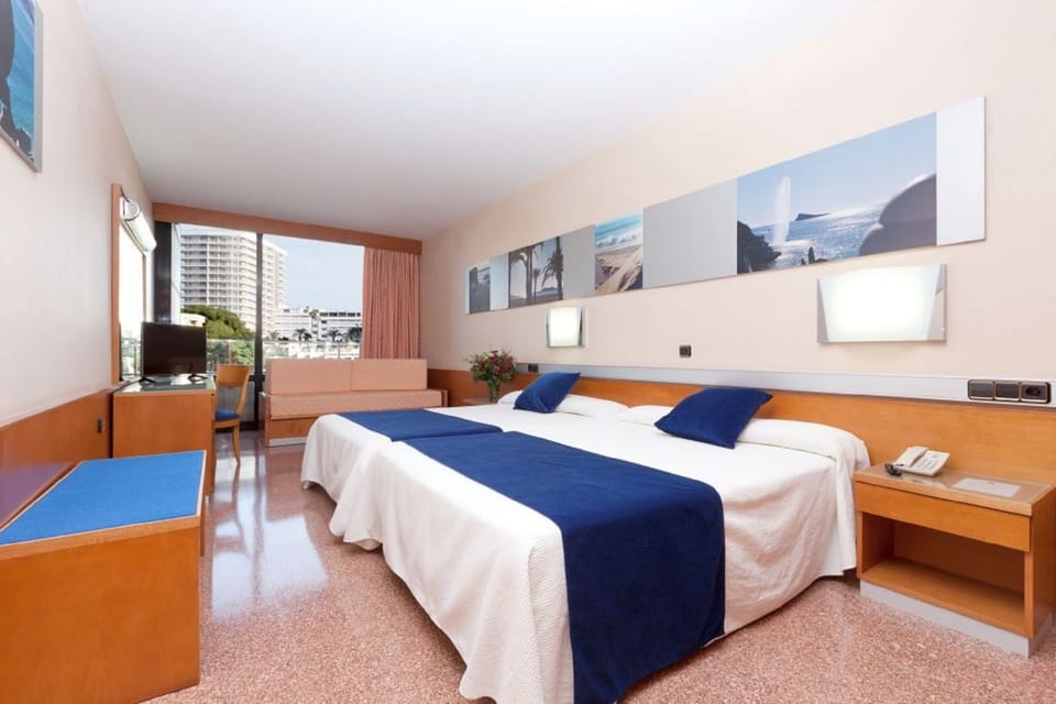 Desk, blackout drapes, WiFi (surcharge), bed sheets