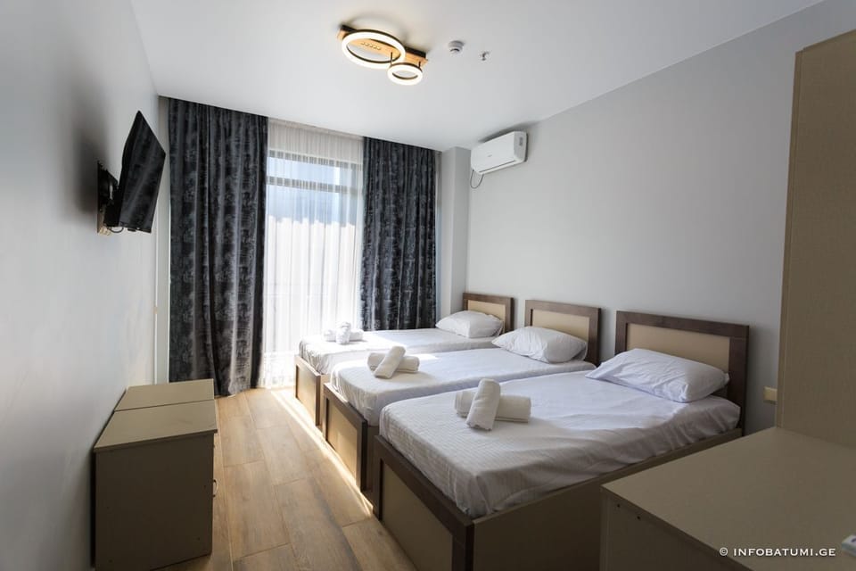 Classic Triple Room, Balcony | Free WiFi