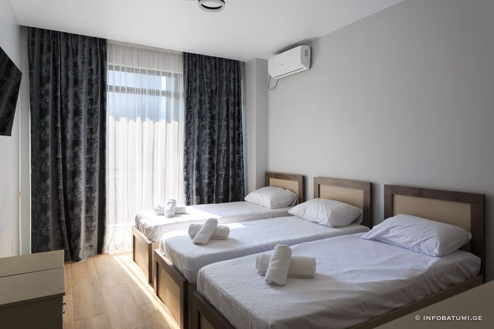 Classic Triple Room, Balcony | Free WiFi