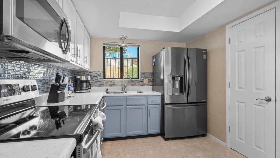 Condo, Multiple Beds, Balcony (Easy Breezy) | Private kitchen