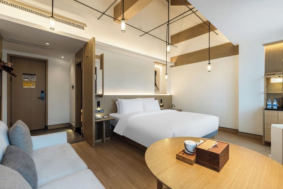 Superior Double Room, City View | Living room | 55-inch LCD TV with cable channels