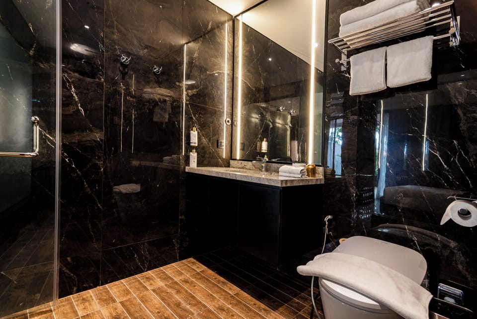Bidet, towels, soap, shampoo