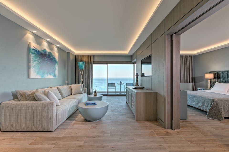 Deluxe Suite, Sea View | In-room safe, blackout drapes, free WiFi, bed sheets