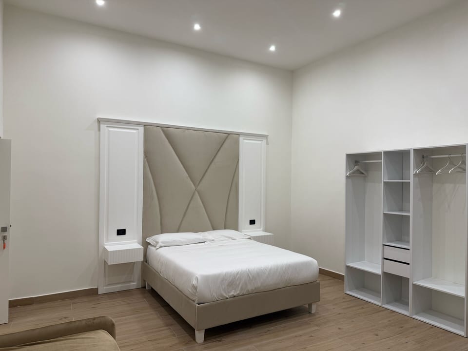 Deluxe Room, Private Bathroom | Down comforters, desk, laptop workspace, soundproofing