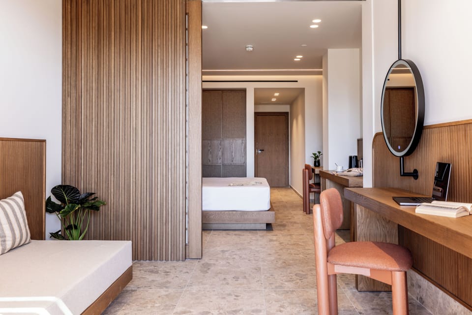 Deluxe Suite with Sea View | In-room safe, blackout drapes, free WiFi