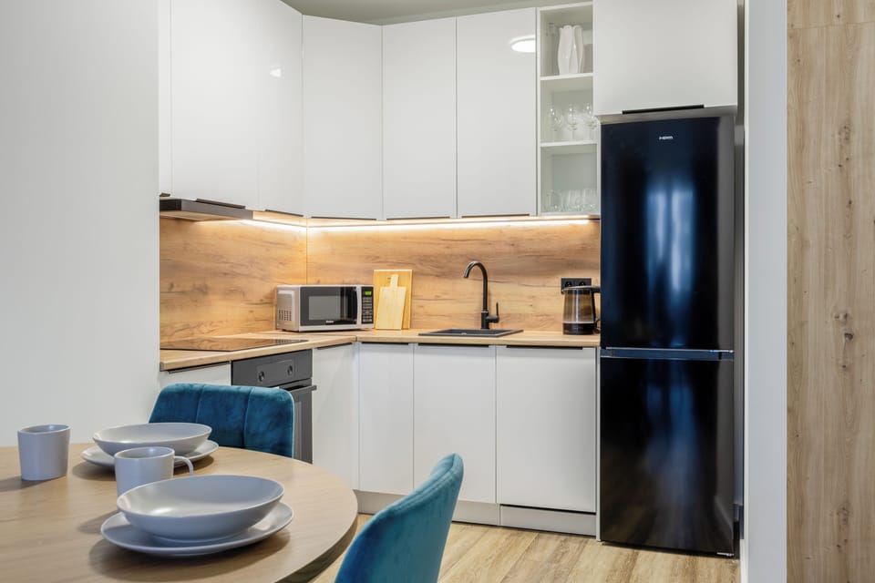 Family Apartment, Balcony | Blackout drapes, iron/ironing board, free WiFi