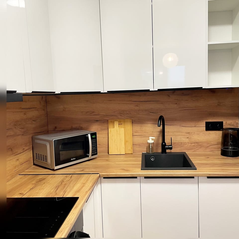 Family Apartment, Balcony | Private kitchenette | Electric kettle