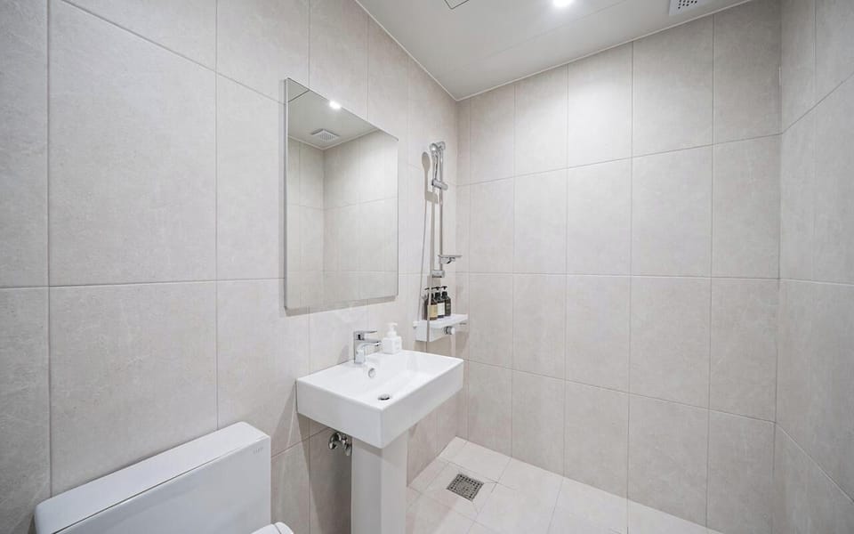 Deluxe Plus | Bathroom | Shower, hair dryer, bathrobes, slippers