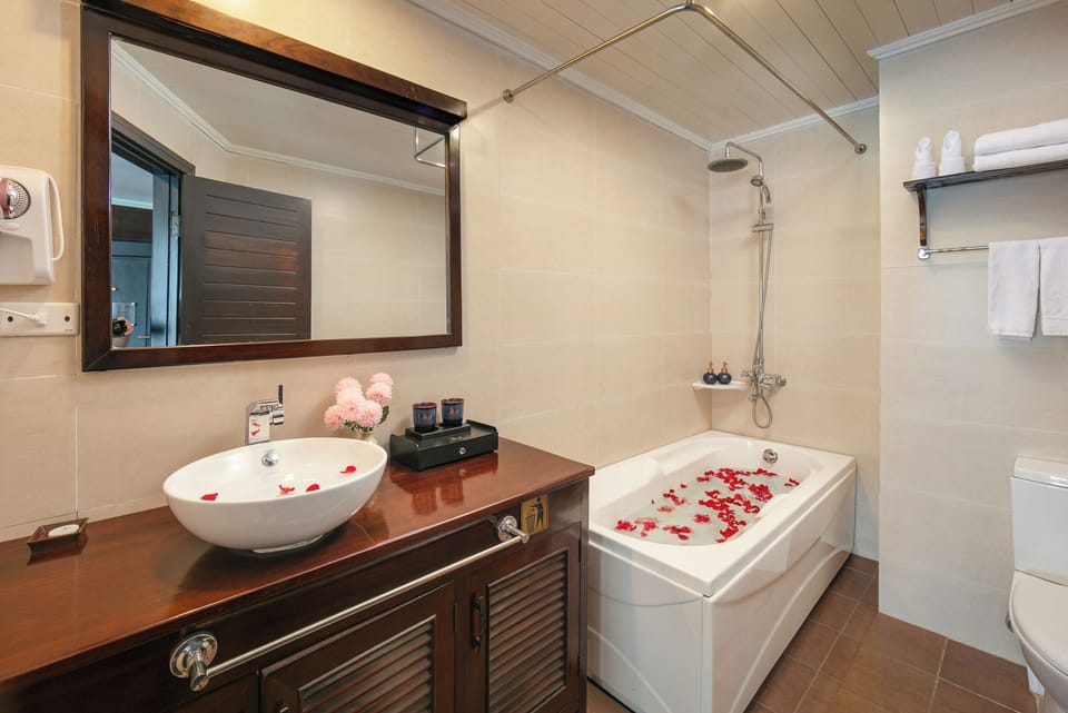 Royal Double Room, Balcony, Bay View | Bathroom | Hair dryer, slippers, towels, soap