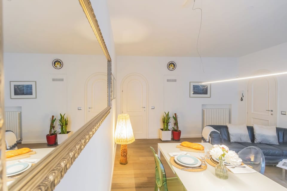 Apartment (1 Bedroom) | Living area | 32-inch TV with cable channels