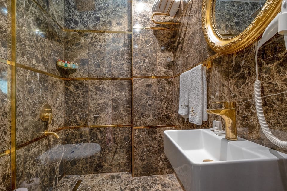 Shower, hair dryer, bathrobes, slippers