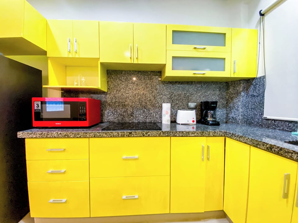 Family Apartment, 2 Bedrooms, Patio, Ground Floor | Private kitchen | Espresso maker, dining tables