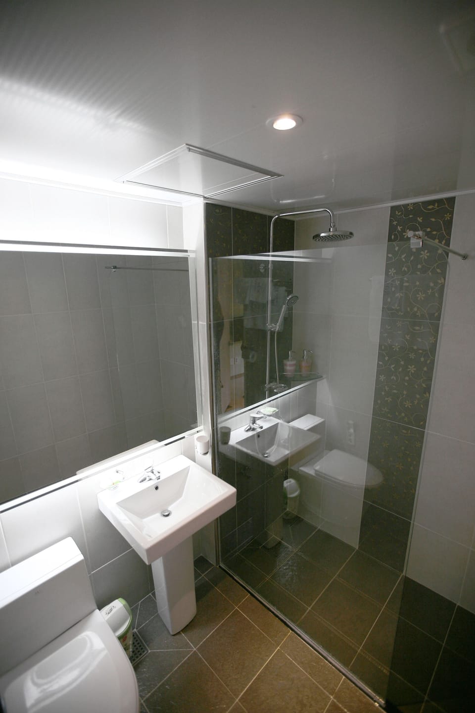 Shower, free toiletries, hair dryer, slippers
