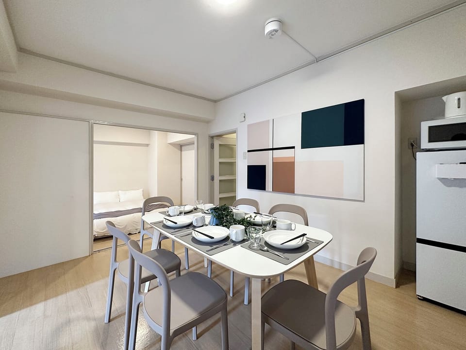 Japanese-style Apartment, Balcony | Living area | 55-inch Smart TV with cable channels