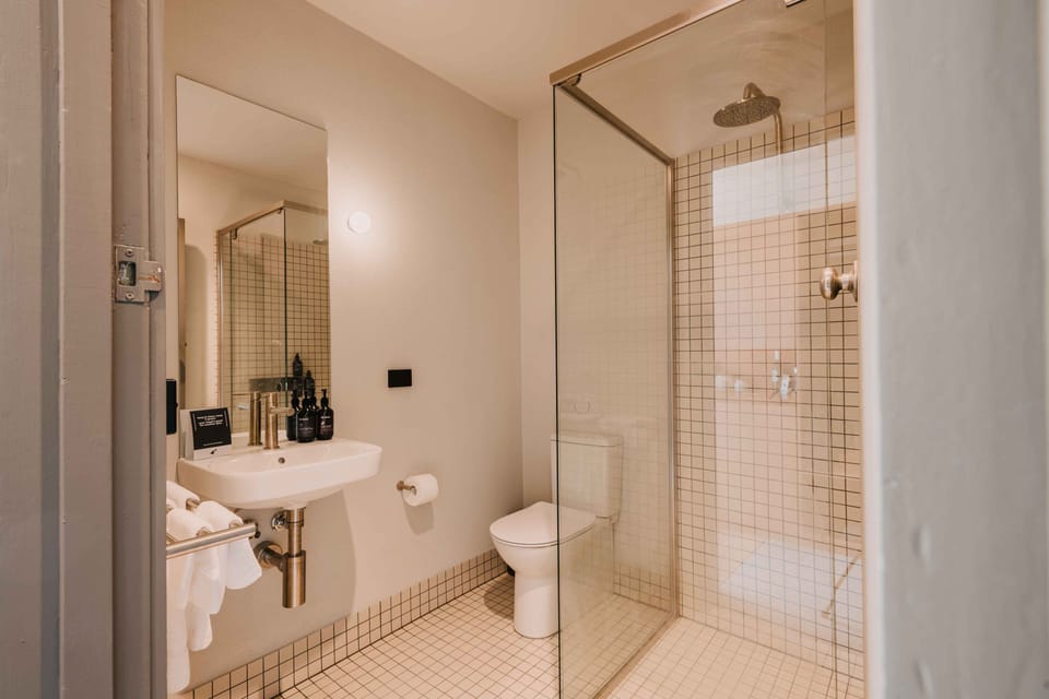 Studio, Patio, Lake View | Bathroom | Shower, towels, soap, shampoo