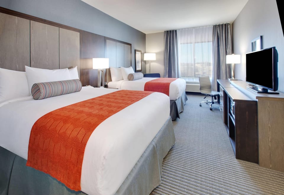 Room, 2 Queen Beds, Non Smoking | In-room safe, desk, blackout drapes, soundproofing