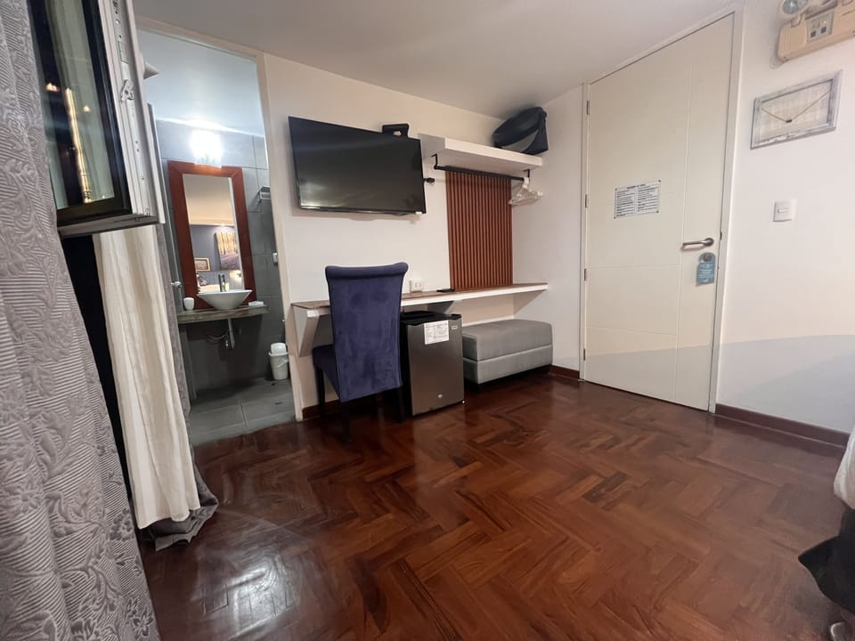 Triple Room, Private Bathroom | Down comforters, minibar, in-room safe, desk
