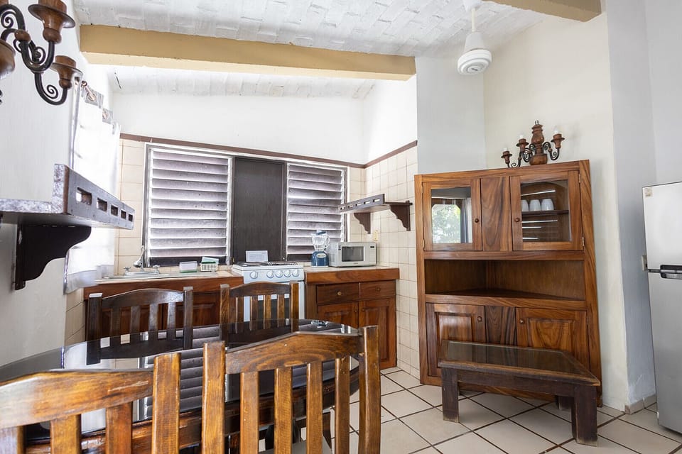 Basic Room, 2 Twin Beds, Garden View | Private kitchen | Full-size fridge, microwave, cookware/dishes/utensils