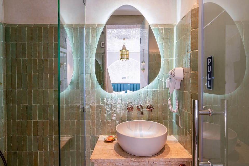 Deluxe Double Room, Private Bathroom | Bathroom | Hair dryer, towels, soap, shampoo