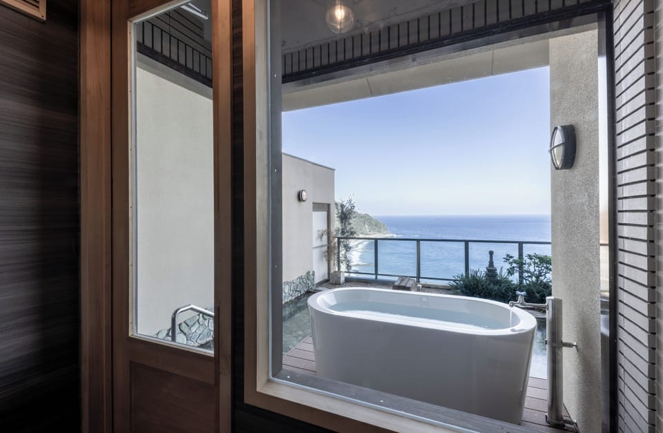 Deluxe Suite, Sauna, Ocean View | Bathroom amenities | Separate tub and shower, spring water tub, free toiletries, hair dryer