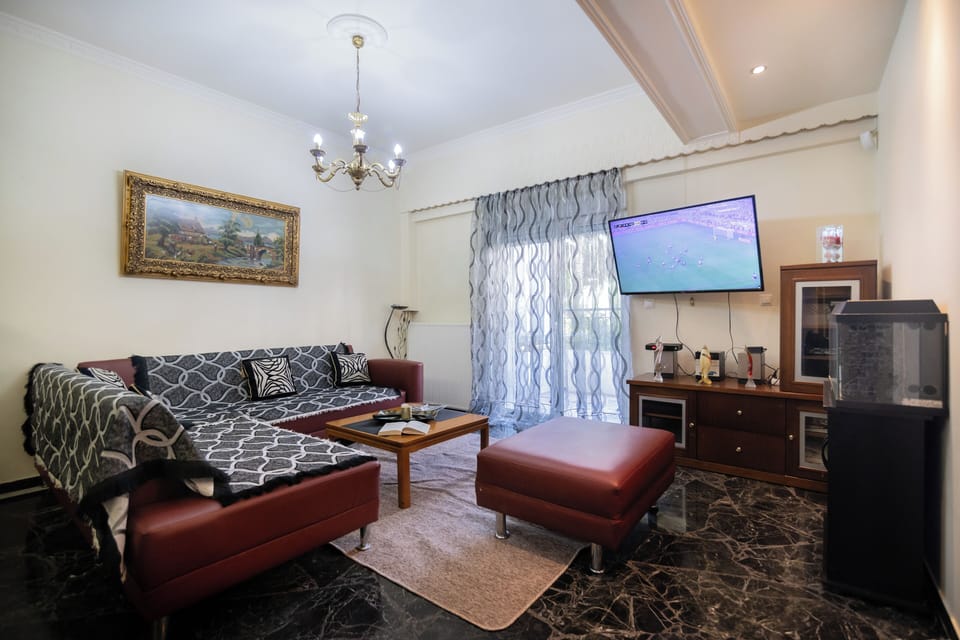 Classic Apartment, 3 Bedrooms, Courtyard View | Living area | 5-inch TV with satellite channels