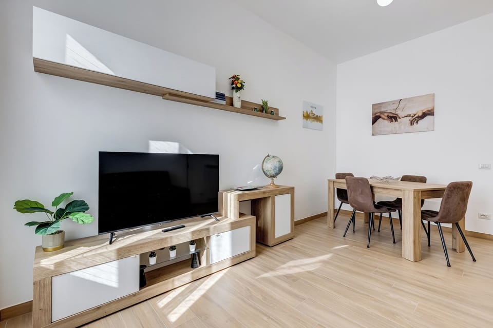 Apartment, 1 Queen Bed with Sofa bed, Kitchen, Courtyard View | Living area | 32-inch flat-screen TV with digital channels
