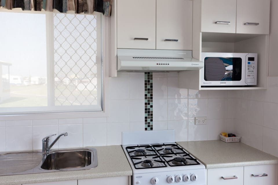 1 Bedroom Ensuite 4 Berth Cabin | Private kitchen | Full-size fridge, microwave, stovetop, coffee/tea maker