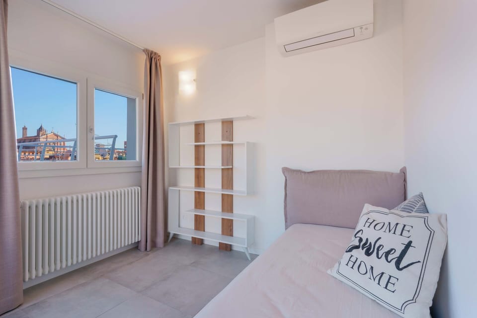 Comfort Condo, City View | Premium bedding, down comforters, memory foam beds, in-room safe
