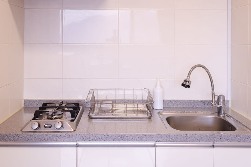 Fridge, microwave, electric kettle, cookware/dishes/utensils