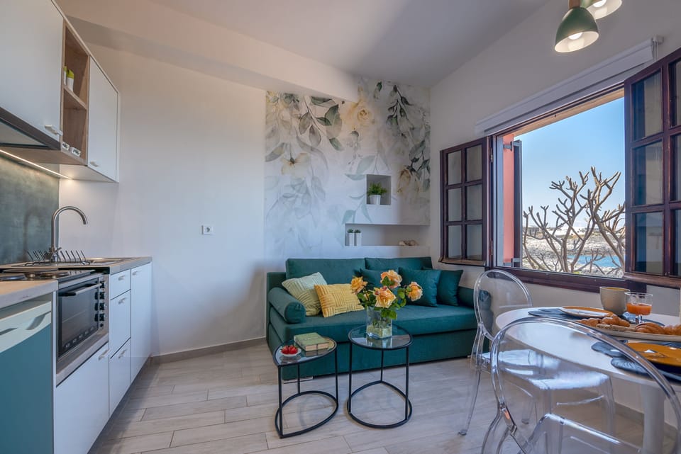 Apartment, 1 Bedroom, Sea View (2 pax) | Living area | 32-inch LED TV with premium channels, TV