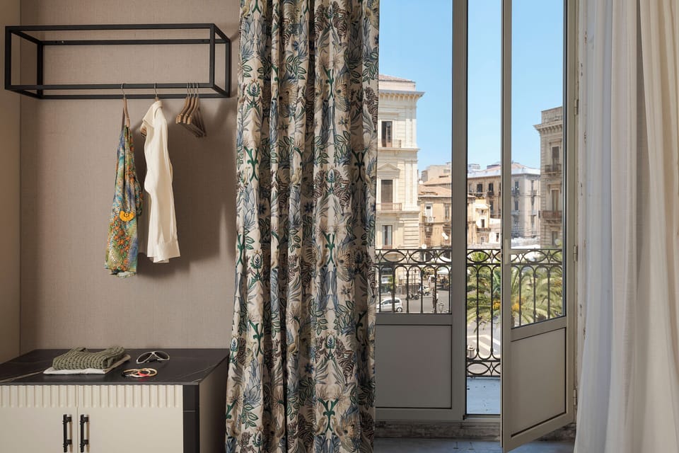 Deluxe Room | Minibar (some free items), in-room safe, laptop workspace