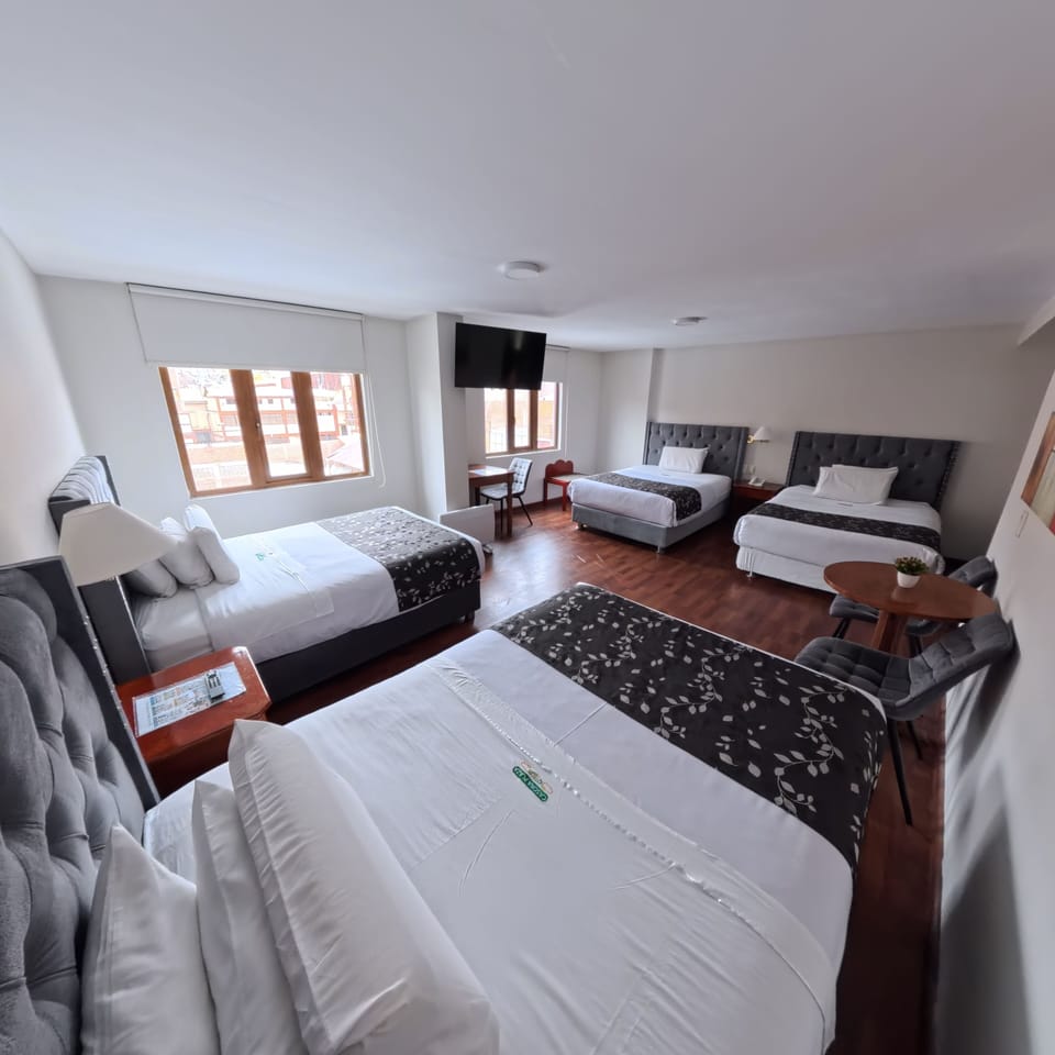 Classic Quadruple Room | In-room safe, desk, blackout drapes, free WiFi