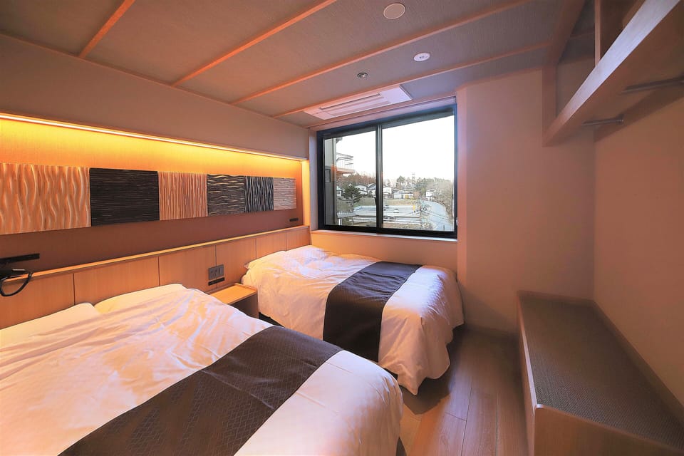 Deluxe Suite, Mountain View | Minibar, in-room safe, desk, laptop workspace